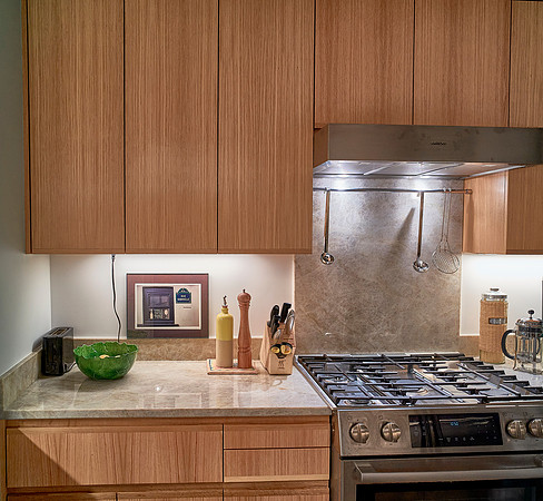 Custom kitchen cabinets and high-end millwork at 880 5th Avenue, NYC by OzanCraft.