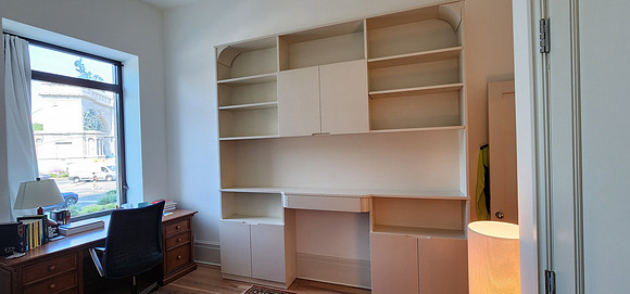 Custom built-in bookshelves and wall unit at 1 Prospect Park West, Manhattan by OzanCraft NYC.