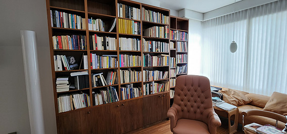 Custom built-in bookshelves and wall unit at Luxury High-rise Azure Condominium E 91 str.  Walnut Built-in Wall Unit, Manhattan by OzanCraft NYC.