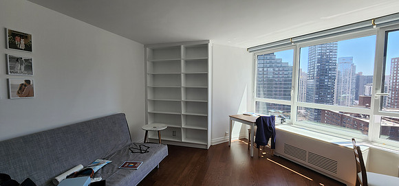 Custom built-in bookshelves and wall unit at 200 East 94th str., Manhattan by OzanCraft NYC.